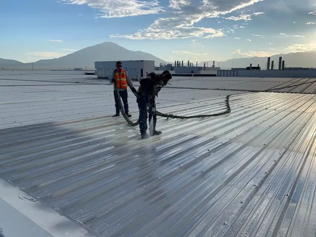 Polyurea roofing application