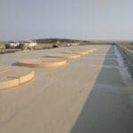 geotextile containment structure with pads