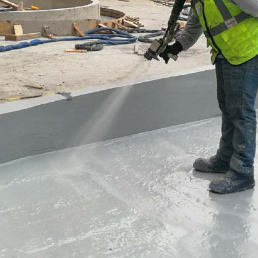 spraying polyurea to protect concrete