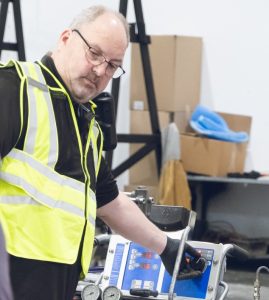 technician working a machine